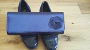 Navy shoes and clutch bag combo